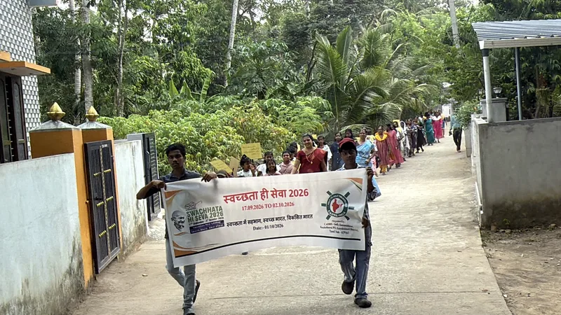 Participants carrying a Swachh Bharat banner during the community rally
